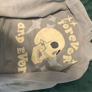 Gray Hoodie with Skull and Text Design